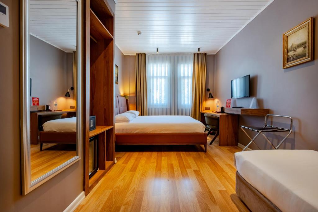 Postel nebo postele na pokoji v ubytování Armagrandi Spina Hotel-Special Category