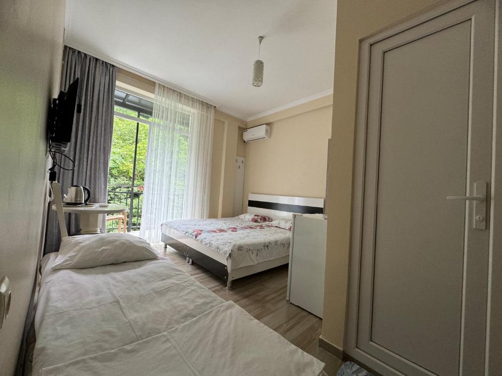 Postel nebo postele na pokoji v ubytování Royal House