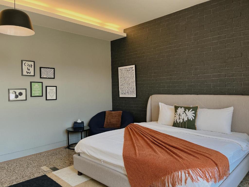 Postel nebo postele na pokoji v ubytování Minilove Homestay