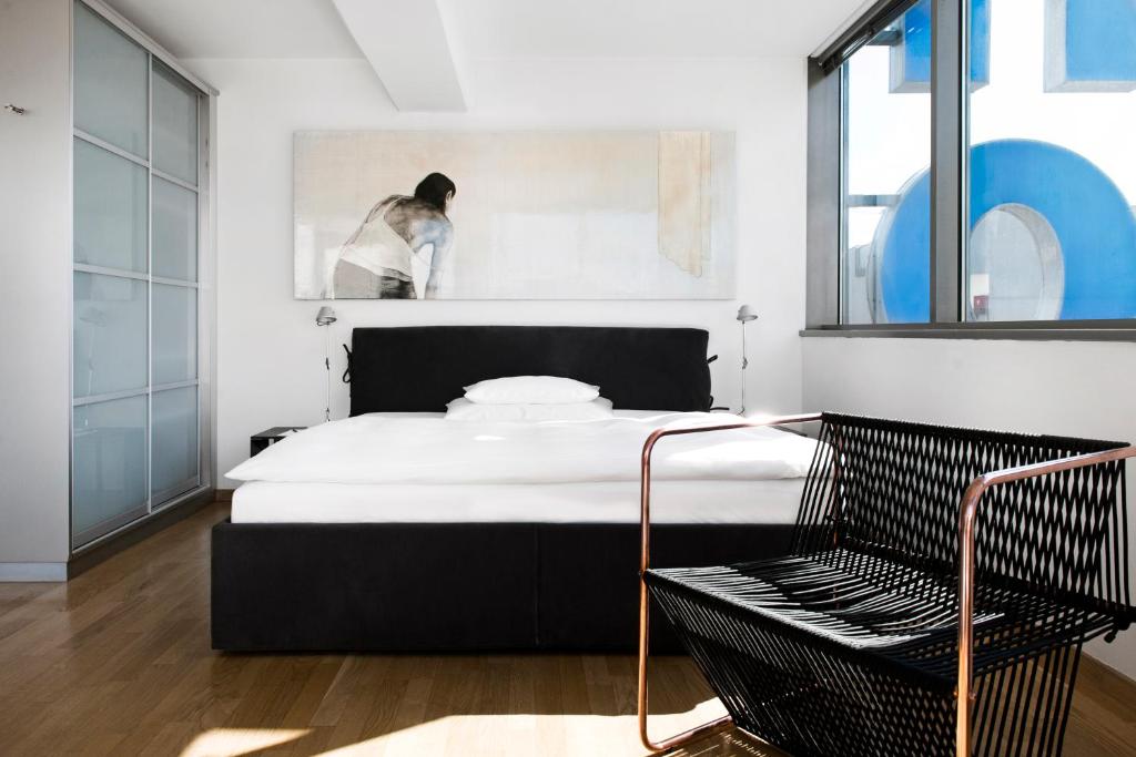 Voodi või voodid majutusasutuse Augarten Art Hotel, a Member of Design Hotels toas
