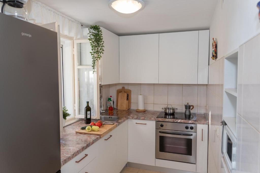 Kuchyň nebo kuchyňský kout v ubytování House Klementina
