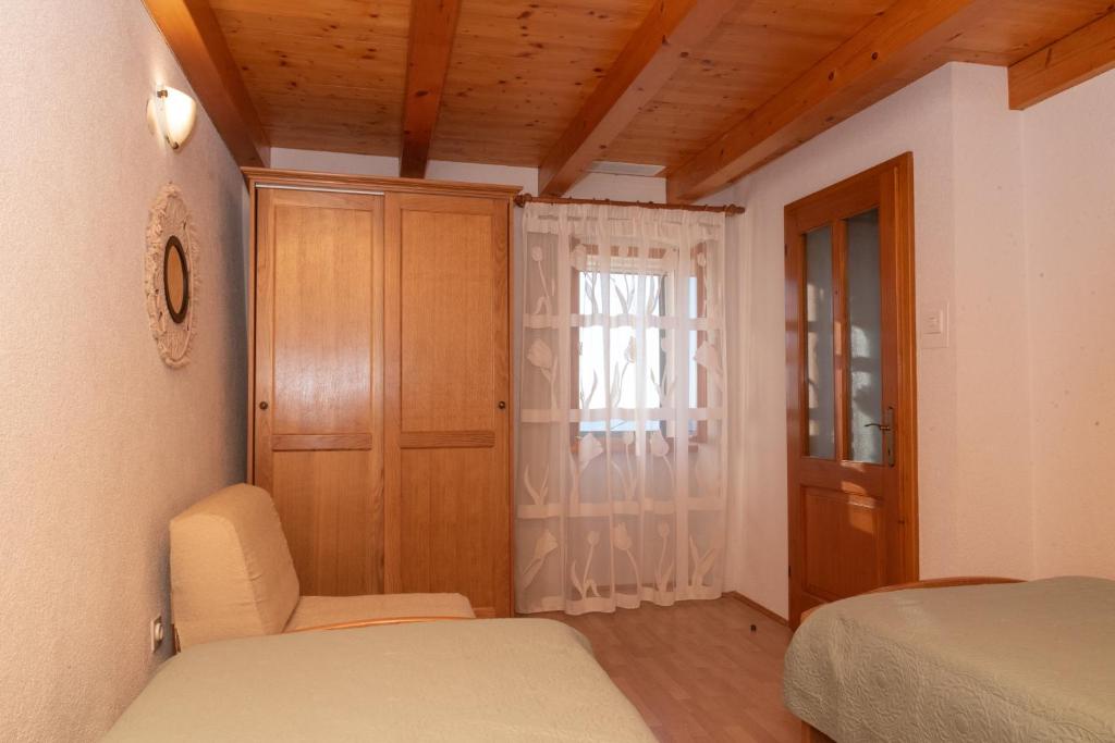 Postel nebo postele na pokoji v ubytování House Klementina