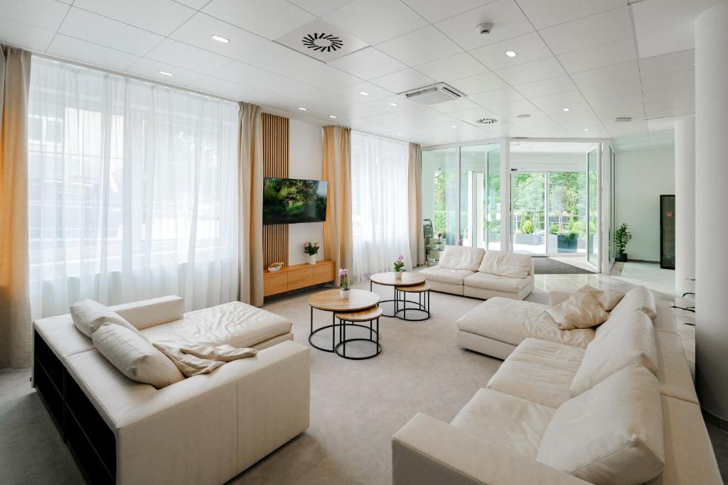 TV a/nebo společenská místnost v ubytování Hotel Silenzio