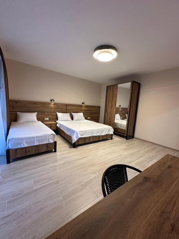 Postel nebo postele na pokoji v ubytování Paradise Shekvetili