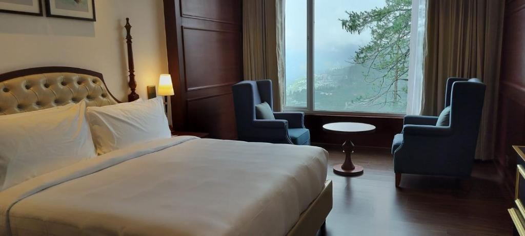 Postel nebo postele na pokoji v ubytování Hotel Greenberry Narkanda
