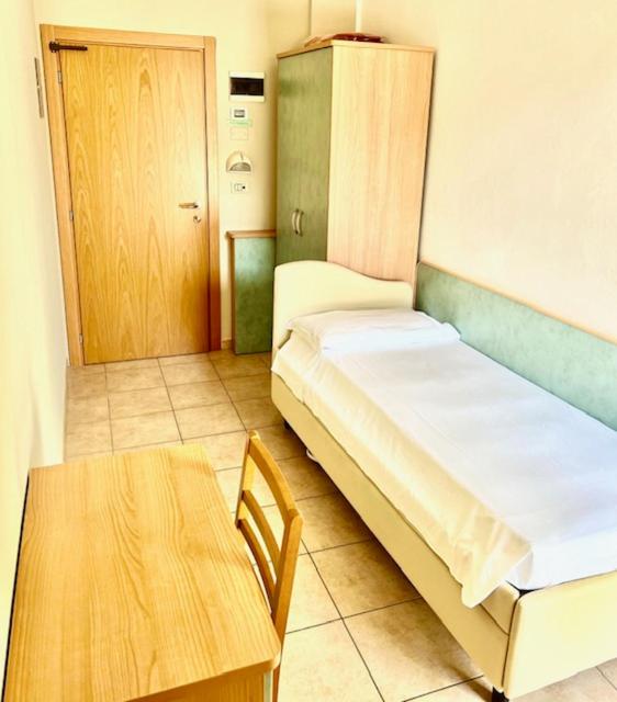 Postel nebo postele na pokoji v ubytování Lotus Hotel ALL INCLUSIVE & SPIAGGIA