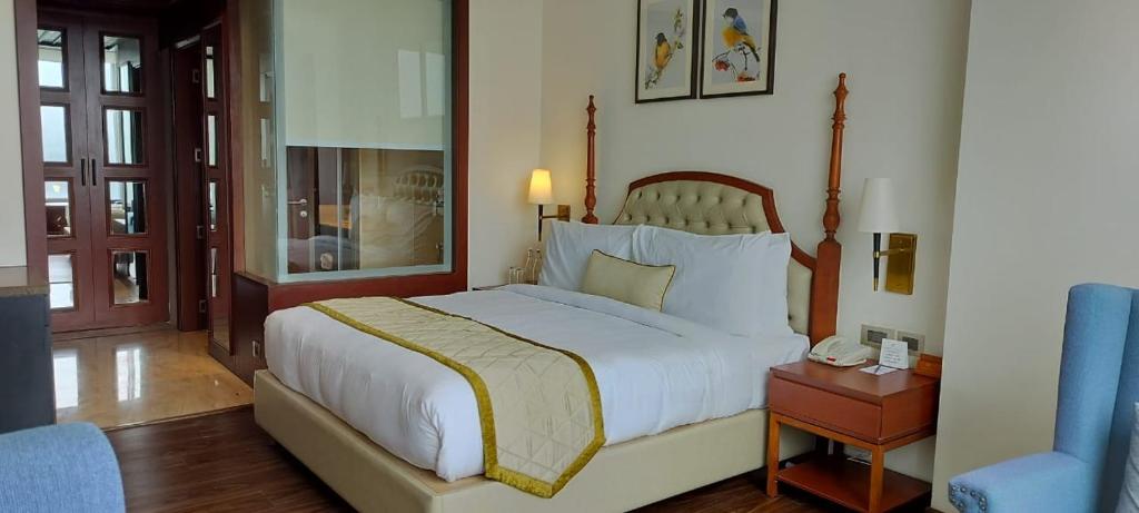 Postel nebo postele na pokoji v ubytování Hotel Greenberry Narkanda