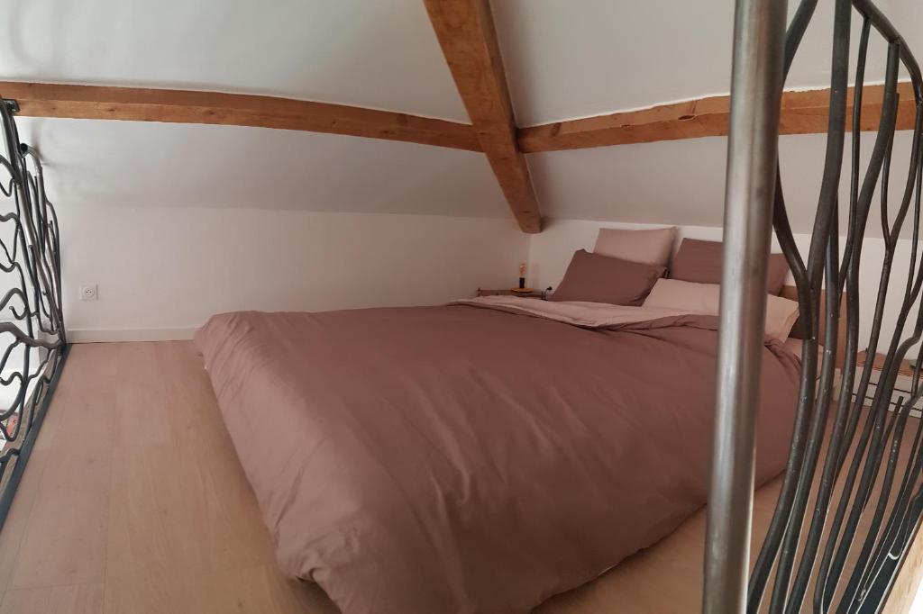Postel nebo postele na pokoji v ubytování La Guiraudette