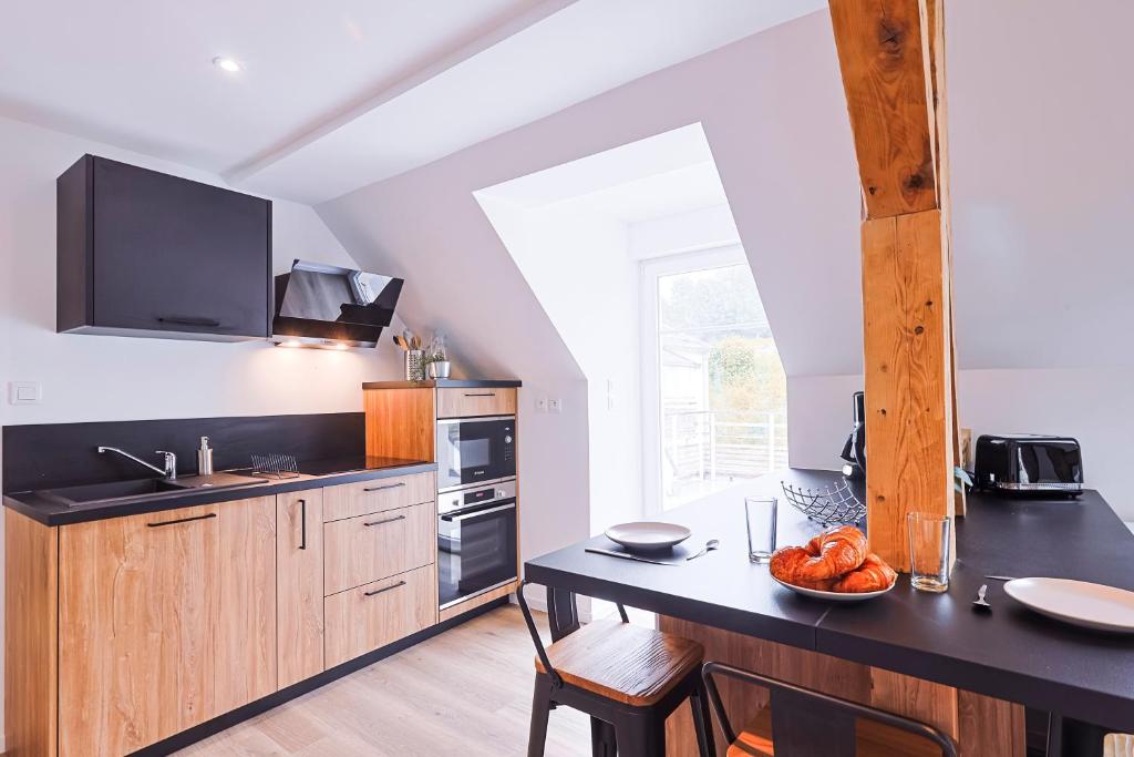 Kuchyň nebo kuchyňský kout v ubytování Appartements Les Vosges