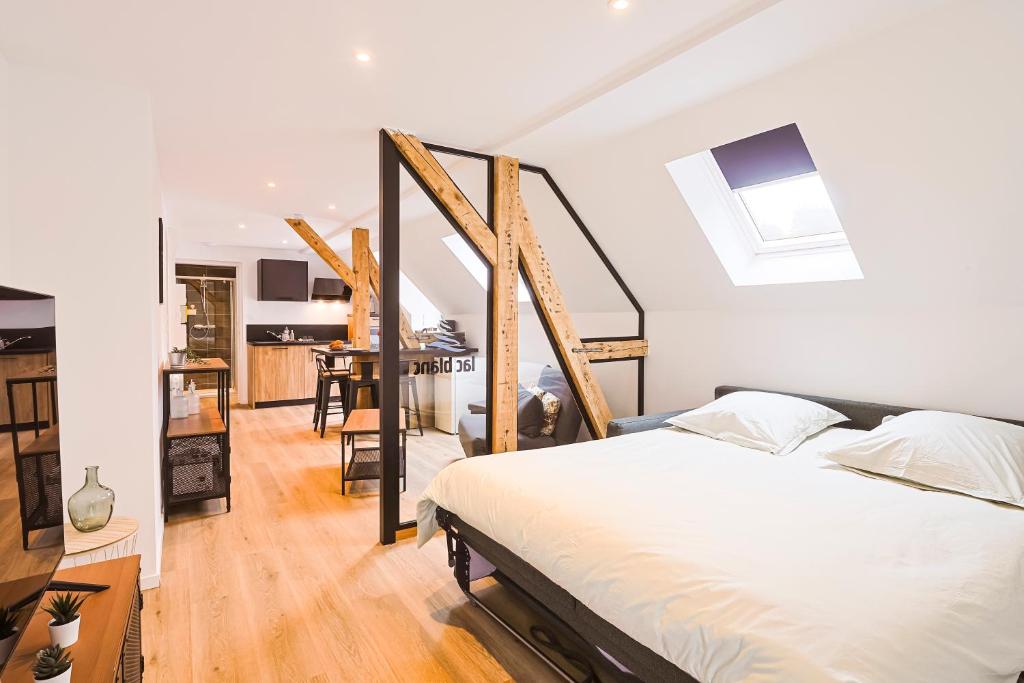 Postel nebo postele na pokoji v ubytování Appartements Les Vosges