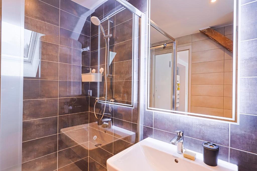 Koupelna v ubytování Appartements Les Vosges