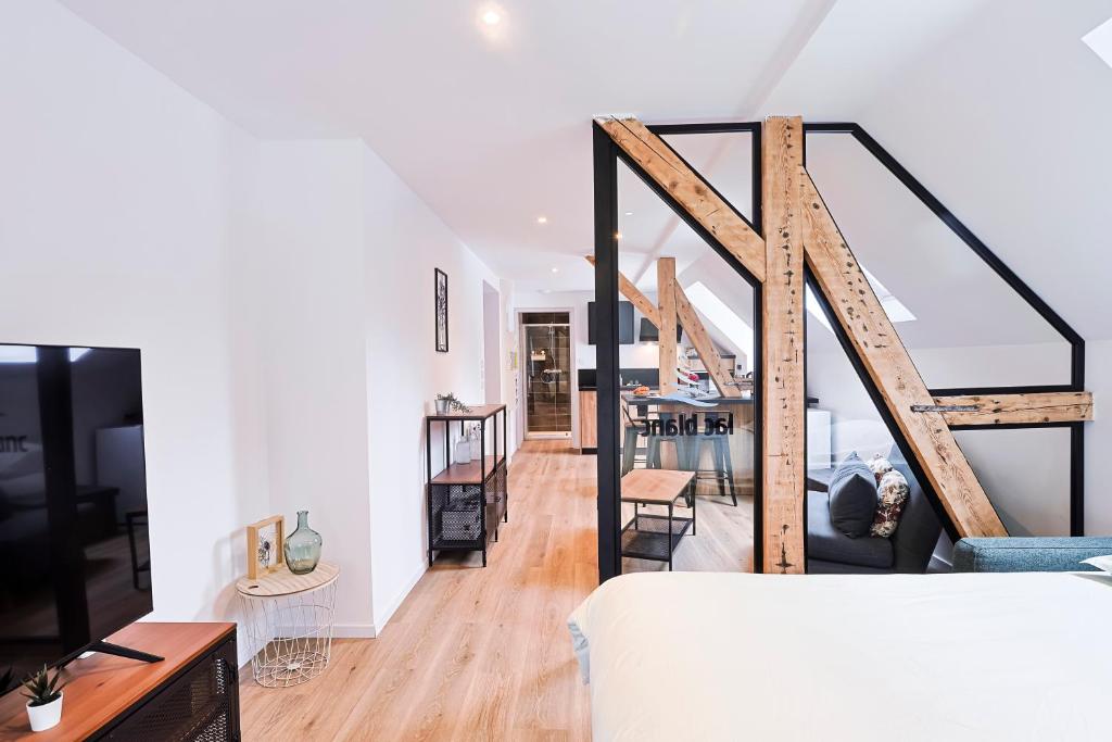 Postel nebo postele na pokoji v ubytování Appartements Les Vosges