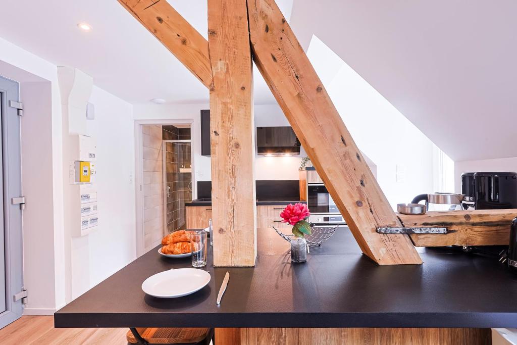 Kuchyň nebo kuchyňský kout v ubytování Appartements Les Vosges