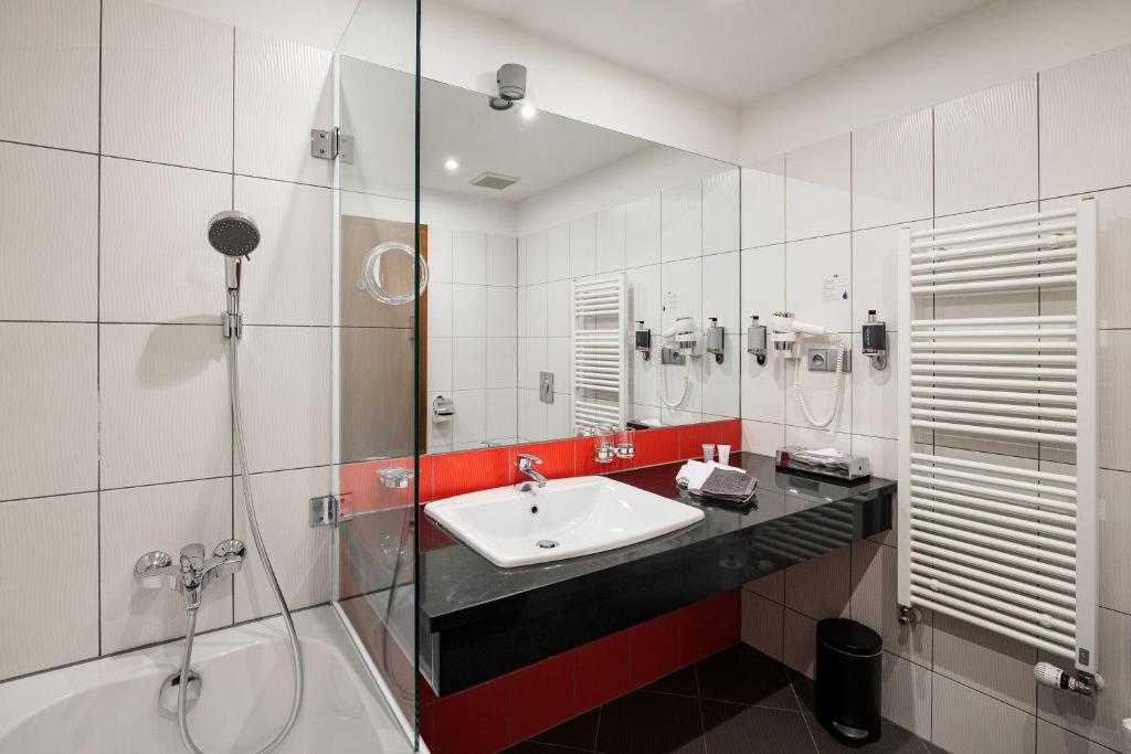 Koupelna v ubytování Hotel Silenzio