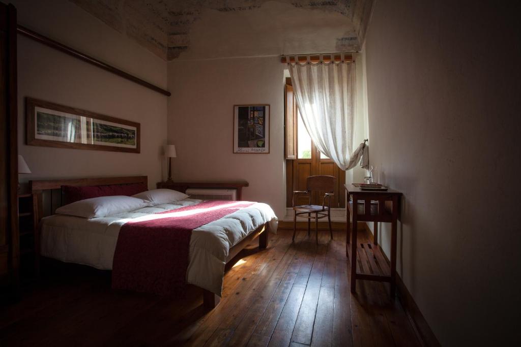 Postel nebo postele na pokoji v ubytování Piazza San Pantaleo