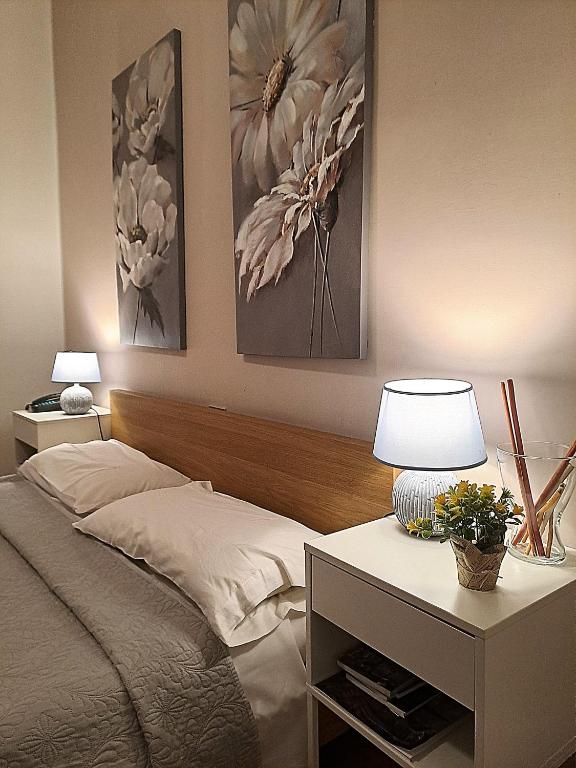 Postel nebo postele na pokoji v ubytování Hotel Del Viale