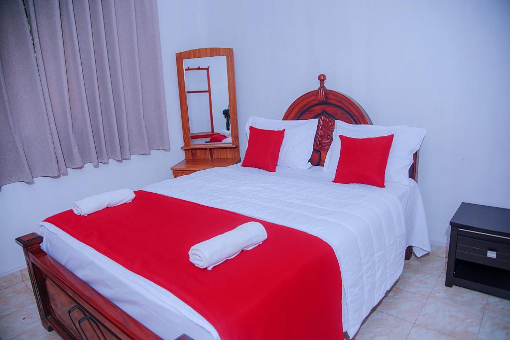 Postel nebo postele na pokoji v ubytování Freedom Guest Inn Ella