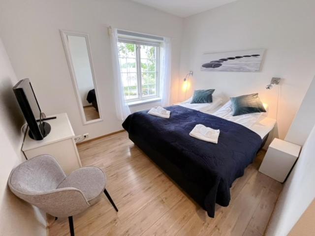 Postel nebo postele na pokoji v ubytování Verkshotellet Jørpeland