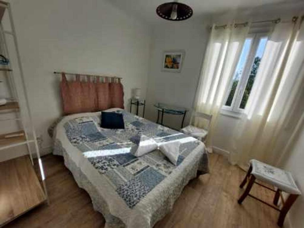 Postel nebo postele na pokoji v ubytování Hotel au Charme du Levat