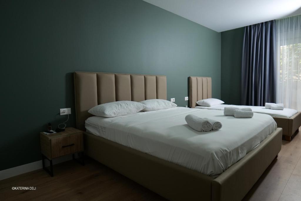 Postel nebo postele na pokoji v ubytování Comfort Rooms Pogradec