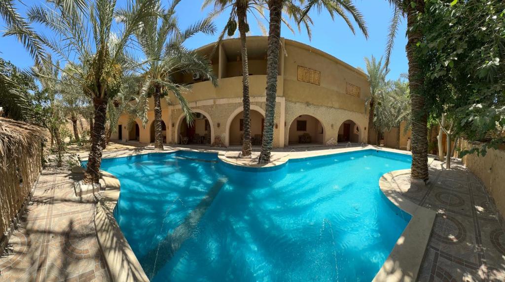 Bazén v ubytování Nour El Waha Hotel nebo v jeho okolí