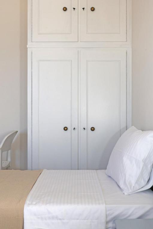 Postel nebo postele na pokoji v ubytování Aira Apartments