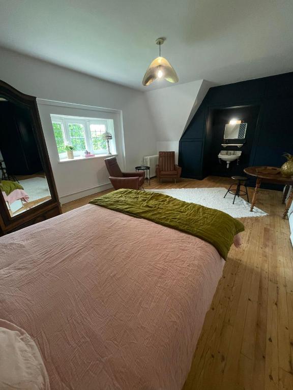 Postel nebo postele na pokoji v ubytování La Mariance