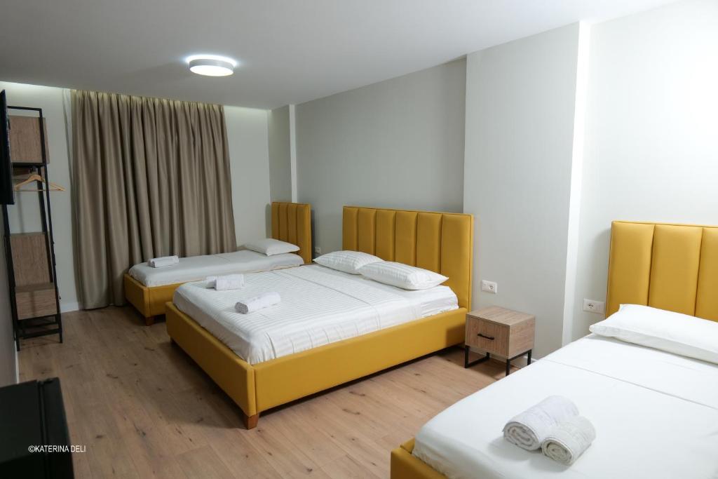 Postel nebo postele na pokoji v ubytování Comfort Rooms Pogradec