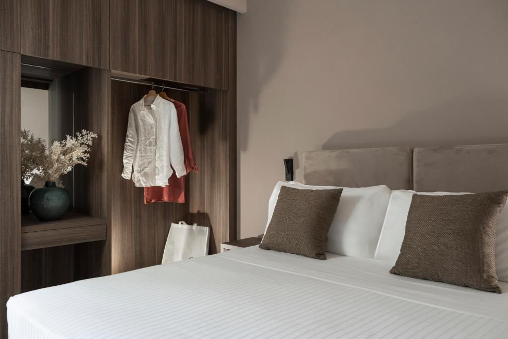 Postel nebo postele na pokoji v ubytování Bolina Suite & Spa