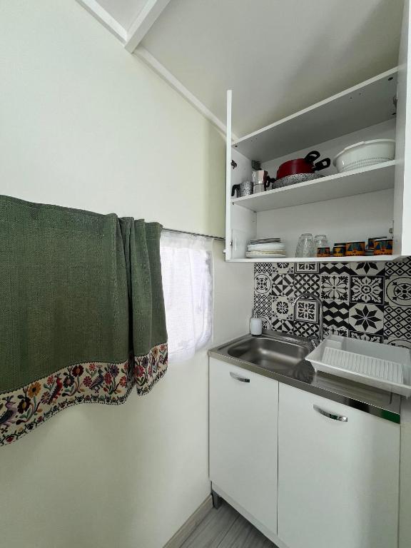 Kuchyň nebo kuchyňský kout v ubytování Camping Car Palmasera