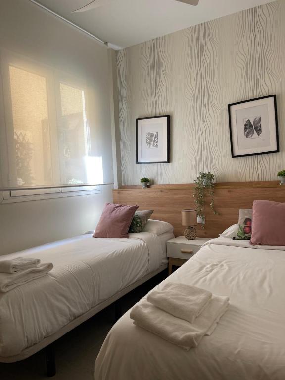 Postel nebo postele na pokoji v ubytování Viento FreshApartments