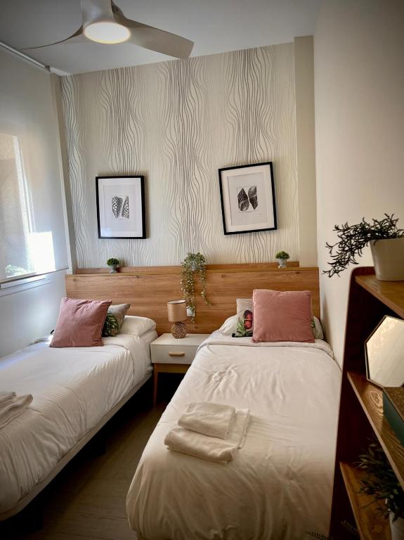 Postel nebo postele na pokoji v ubytování Viento FreshApartments