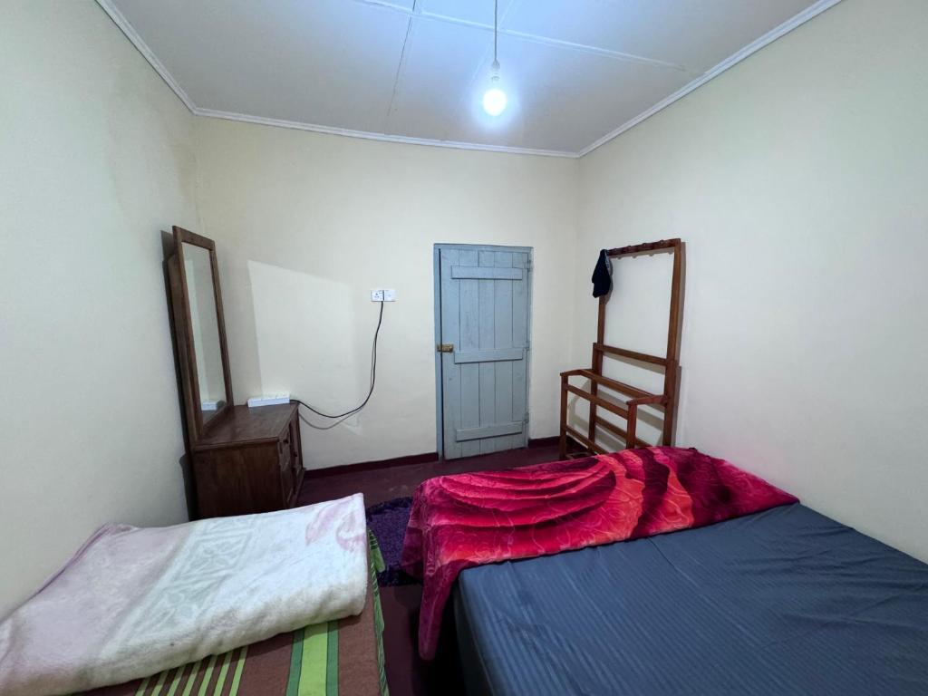 Postel nebo postele na pokoji v ubytování Trinity Guest-Inn