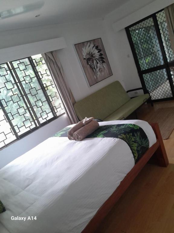 Postel nebo postele na pokoji v ubytování Residence71Nadi Fiji