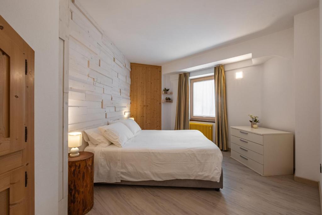 Postel nebo postele na pokoji v ubytování Hotel Garnì Zanella