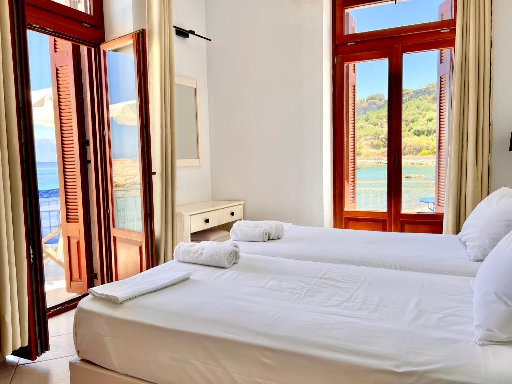 Voodi või voodid majutusasutuse Xenios Zeus Rooms toas