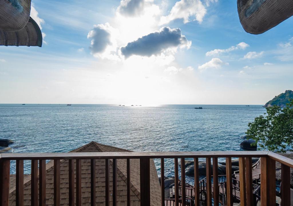 a view of the ocean from a balcony at Dusit Buncha Koh Tao by Riya Group in Ko Tao