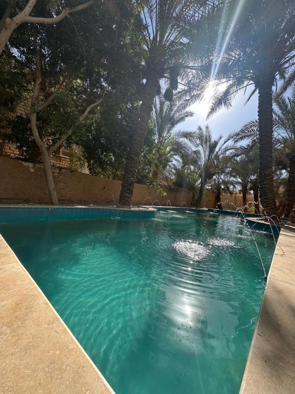 Bazén v ubytování Nour El Waha Hotel nebo v jeho okolí