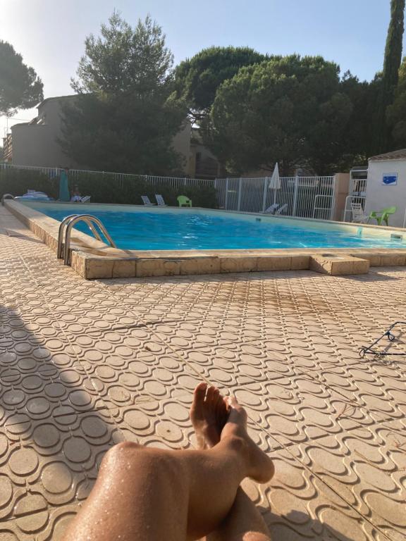 Bazén v ubytovaní Résidence Piscine proche Village naturiste - Pinède alebo v jeho blízkosti