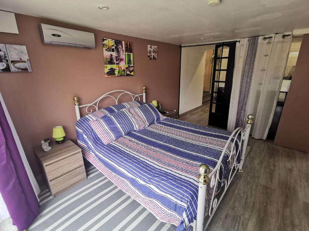 Posteľ alebo postele v izbe v ubytovaní maison