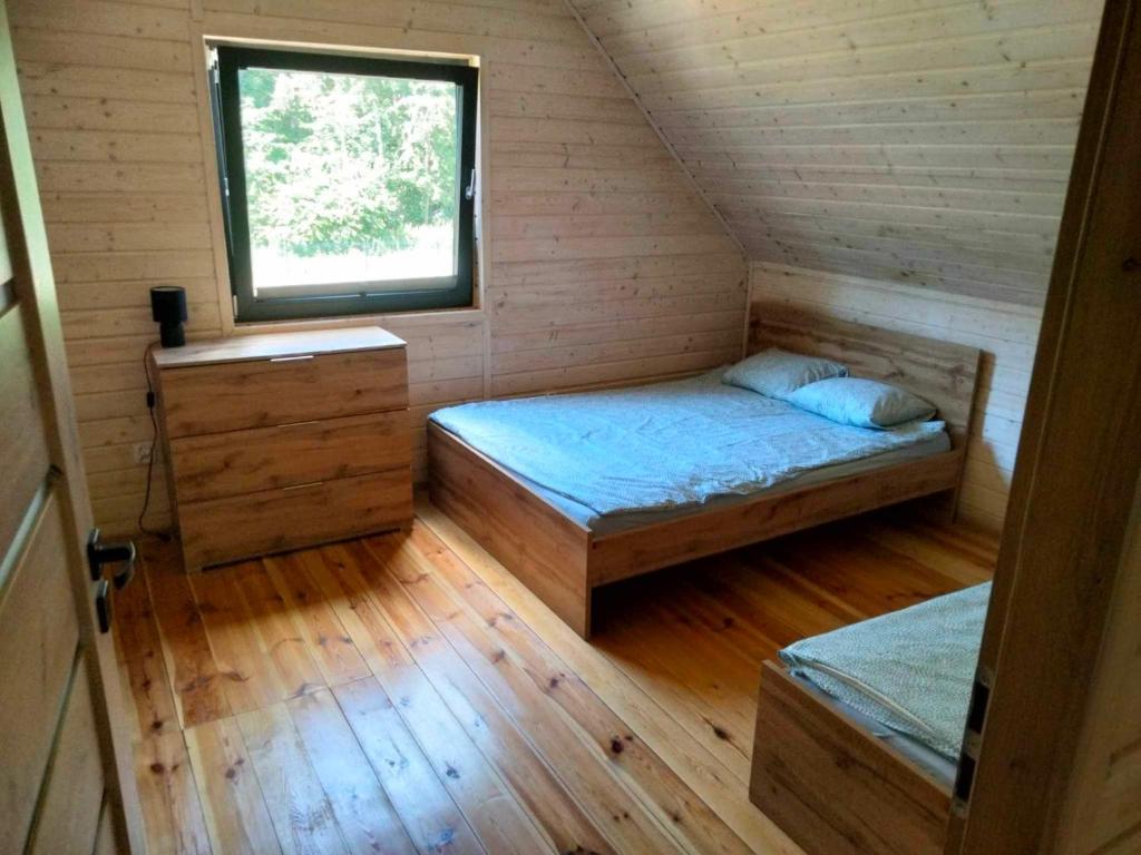 Postel nebo postele na pokoji v ubytování Domki AGA