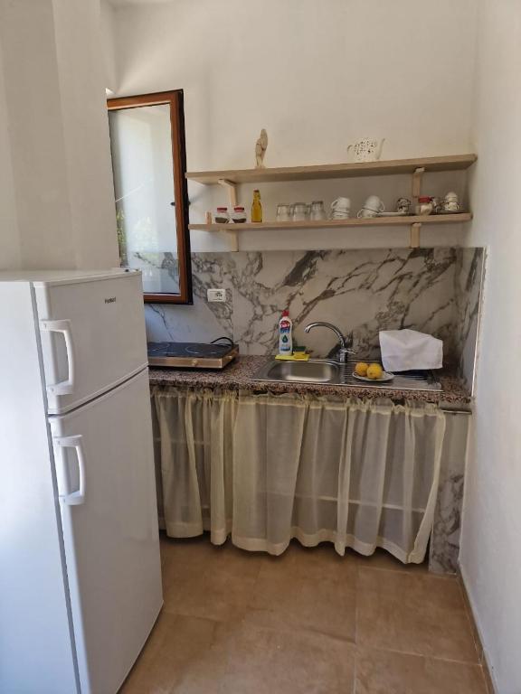 Kuchyň nebo kuchyňský kout v ubytování Besart room