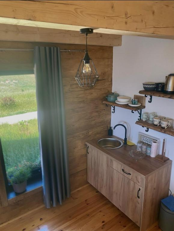 Kuchyň nebo kuchyňský kout v ubytování Adria Nord Chalets
