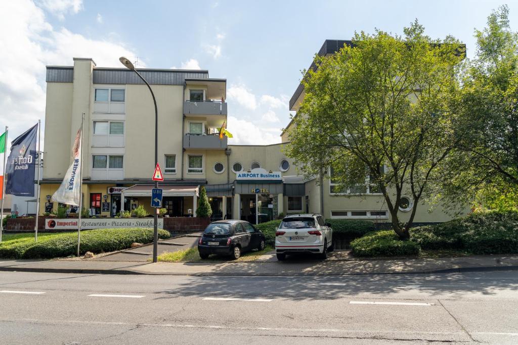 Airport Business Hotel Köln - Quadruple Room With Bathroom
