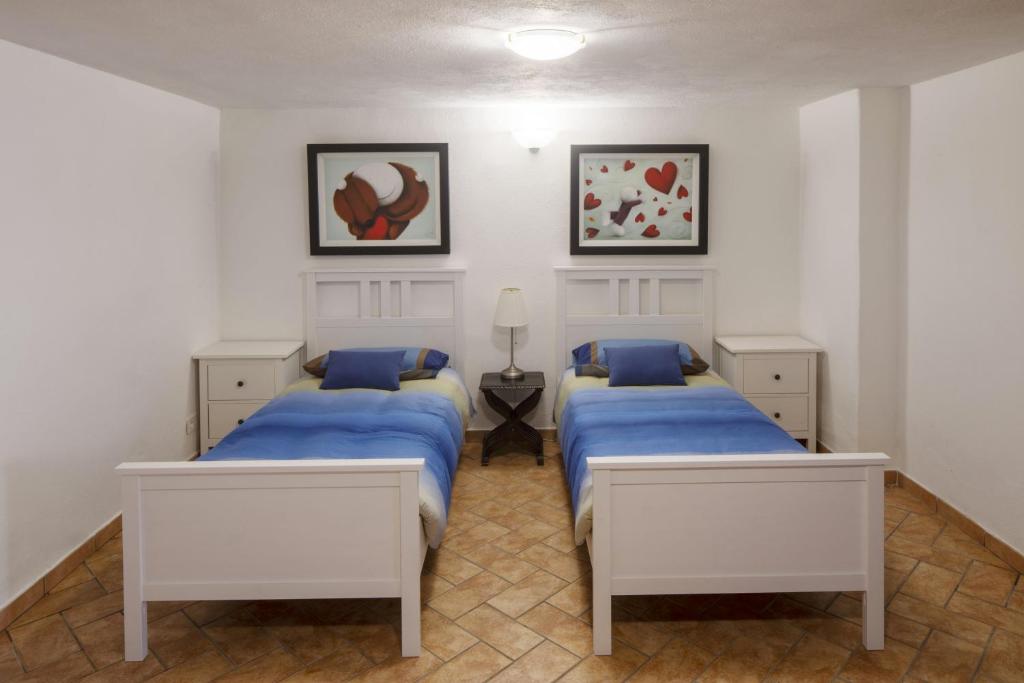 Postel nebo postele na pokoji v ubytování Sant'Anselmo
