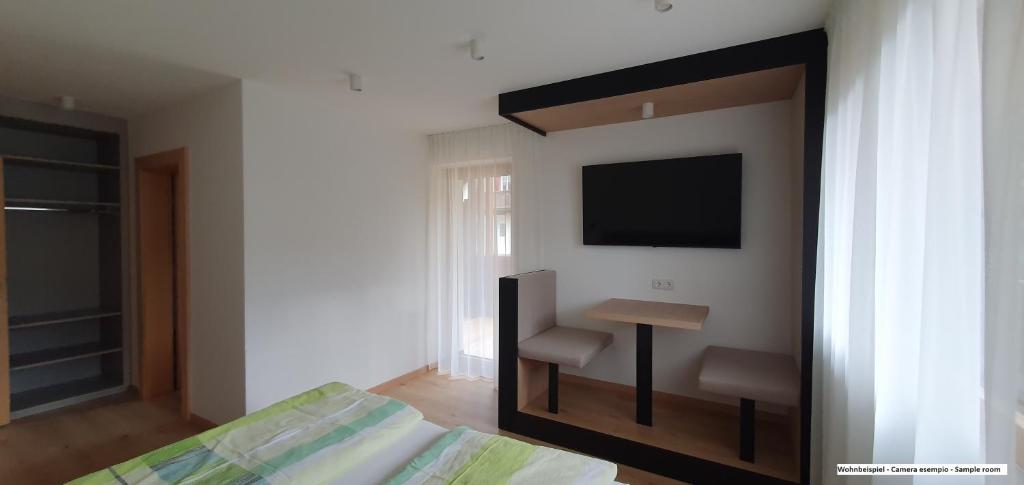 Postel nebo postele na pokoji v ubytování B&B Haus Grüner