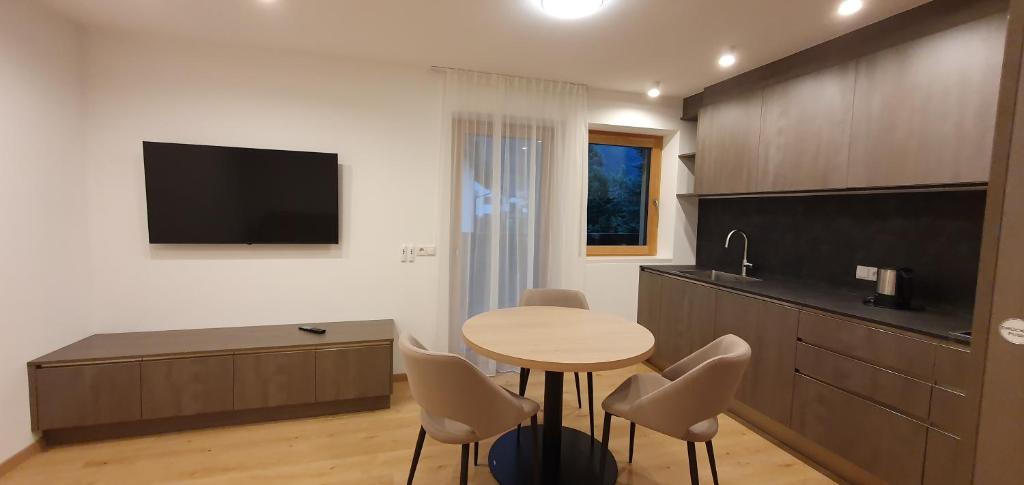TV a/nebo společenská místnost v ubytování B&B Haus Grüner