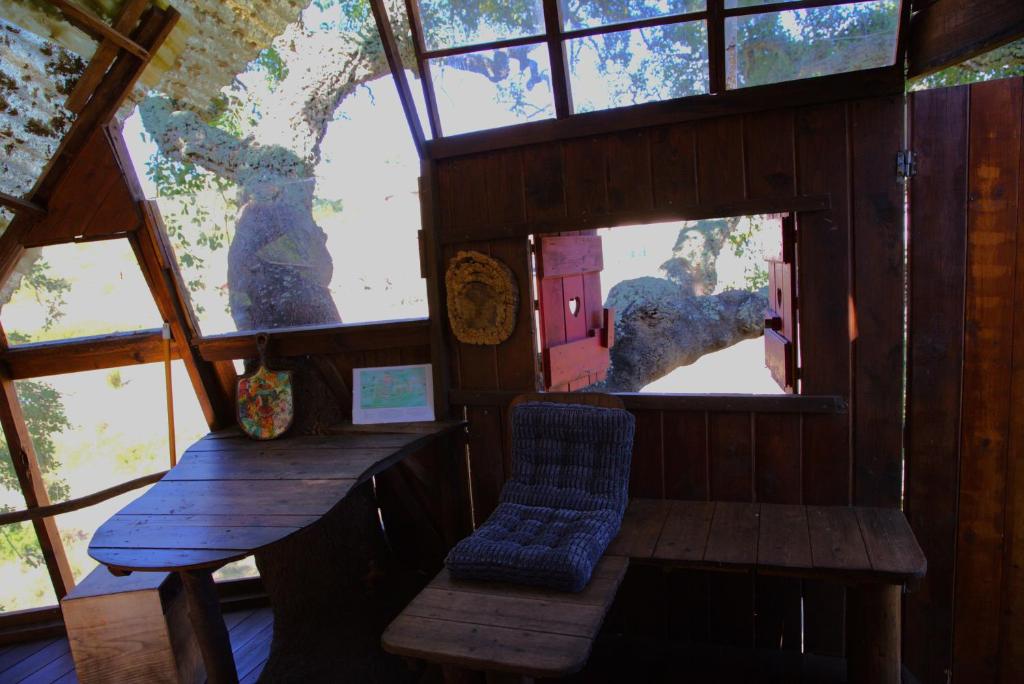 Posezení v ubytování Tree house da Lage