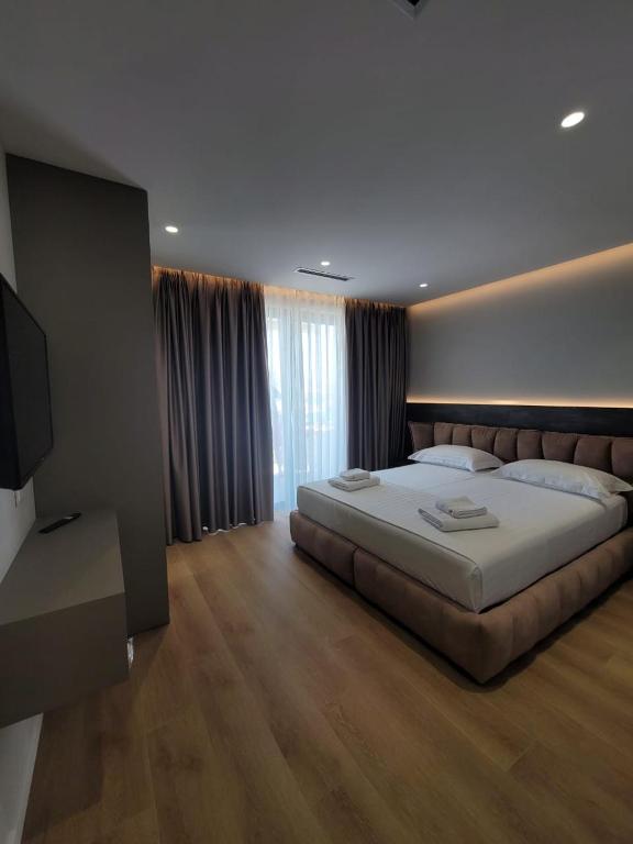 Postel nebo postele na pokoji v ubytování DAED Luxury Residence