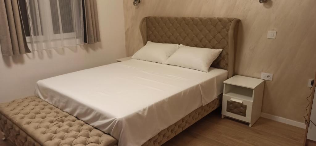 Ένα ή περισσότερα κρεβάτια σε δωμάτιο στο Apartman Mihailo